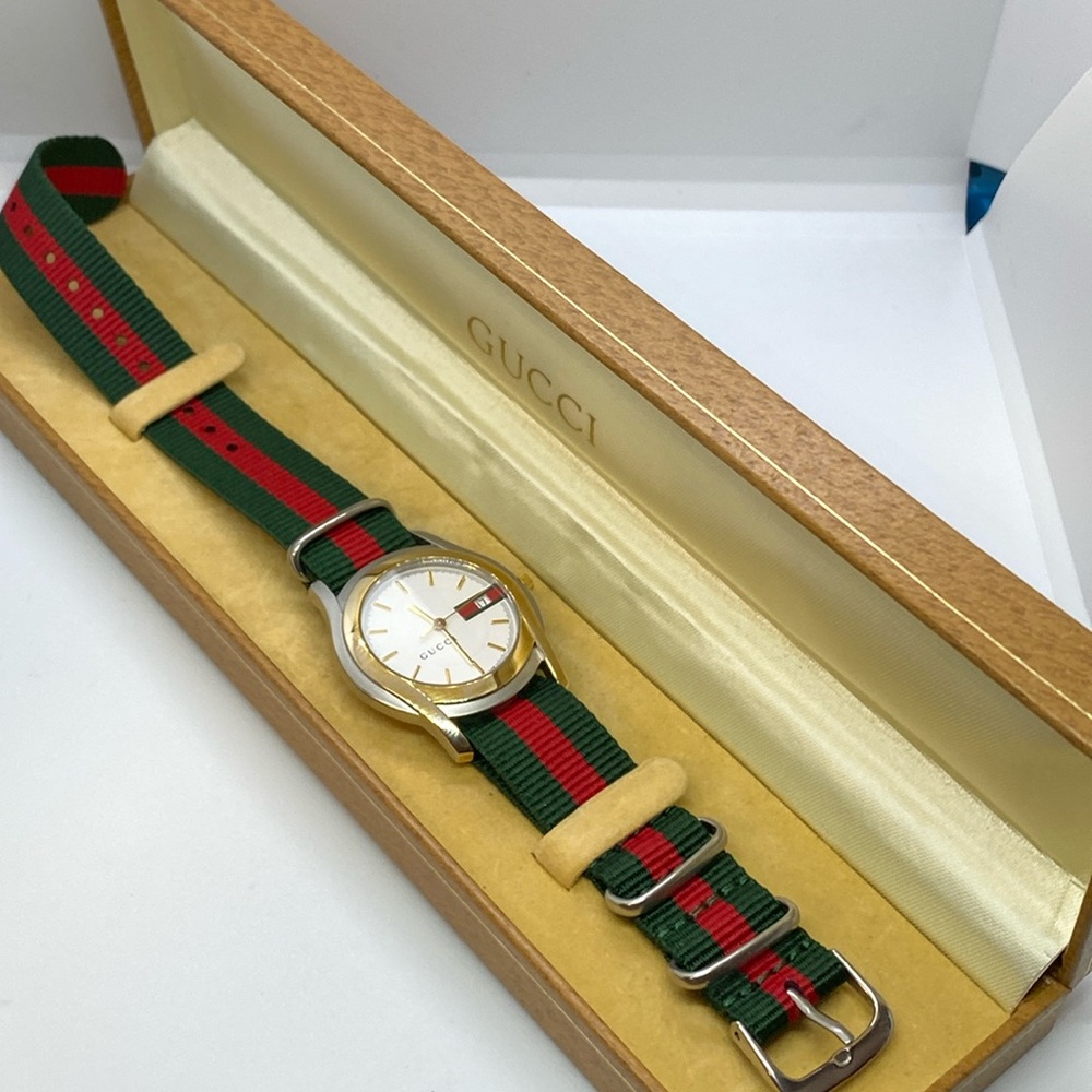 - Gucci 5500 watch